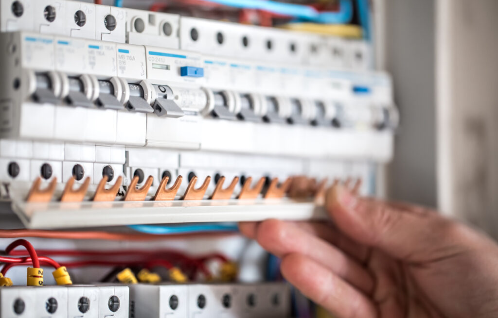 electrical switches installed at an ergonomic height, complying with ADA guidelines for accessibility and safety